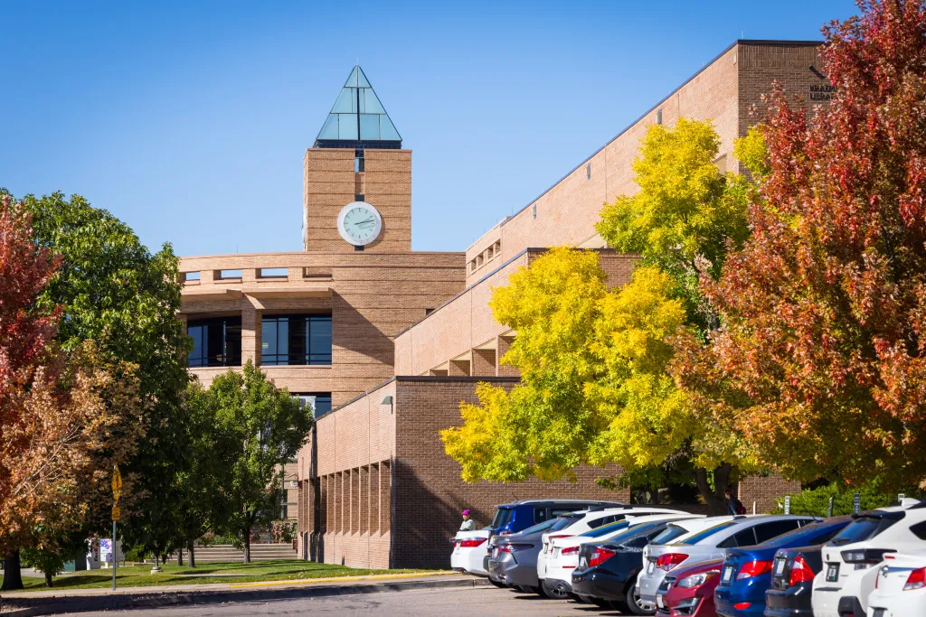 view of the El Pomar clock tower from the parking lot